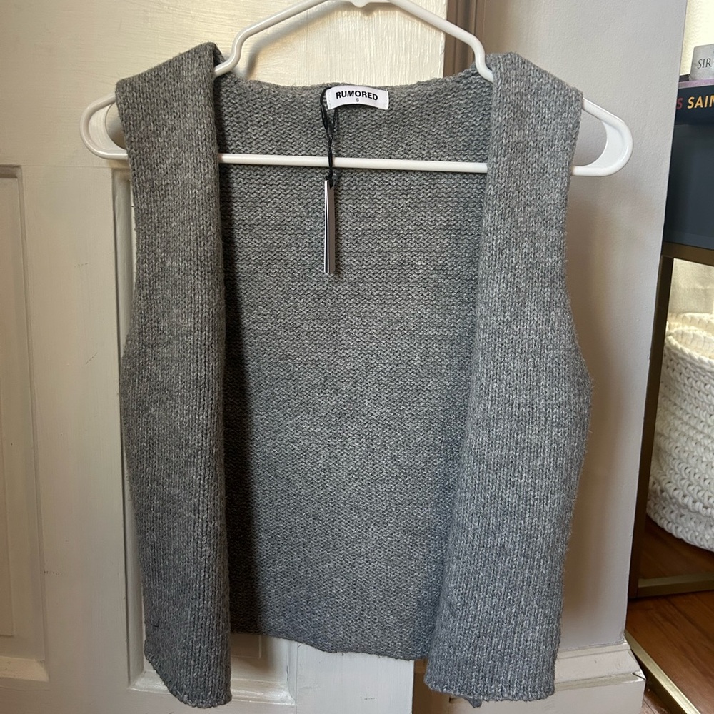 SOLD Rumored grey sweater top NWT 
NEVER WORN